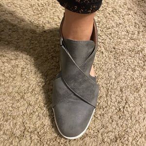 Womens Sneakers with cutouts and slightly raised heel/wedge.  Size 8.5-9